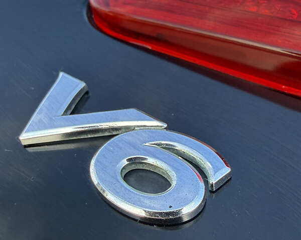 Черный Тойота Камри, объемом двигателя 3.5 л и пробегом 235 тыс. км за 8300 $, фото 31 на Automoto.ua