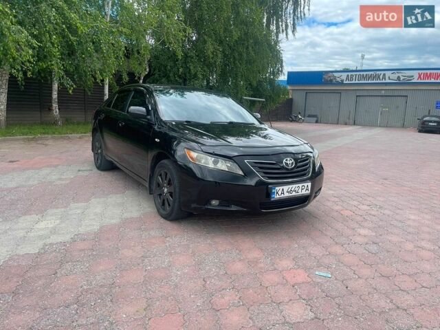 Чорний Тойота Камрі, об'ємом двигуна 2.4 л та пробігом 348 тис. км за 5300 $, фото 1 на Automoto.ua