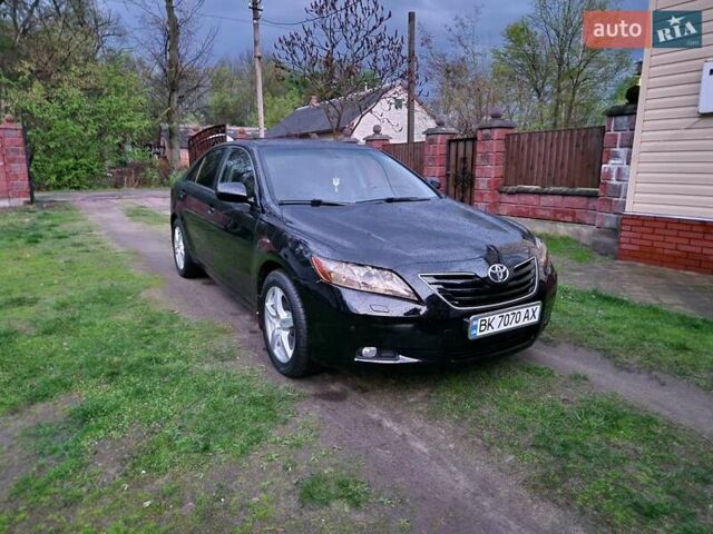 Чорний Тойота Камрі, об'ємом двигуна 2.36 л та пробігом 299 тис. км за 8888 $, фото 8 на Automoto.ua
