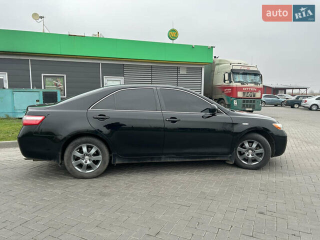 Чорний Тойота Камрі, об'ємом двигуна 2.4 л та пробігом 285 тис. км за 7800 $, фото 6 на Automoto.ua