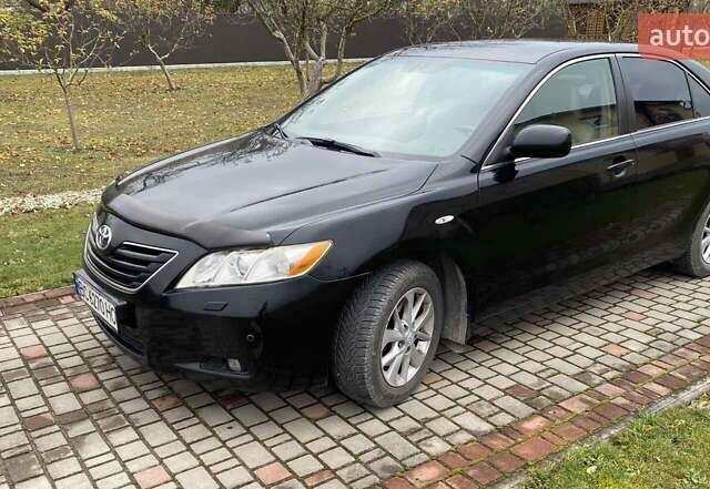 Черный Тойота Камри, объемом двигателя 2.4 л и пробегом 227 тыс. км за 8600 $, фото 6 на Automoto.ua