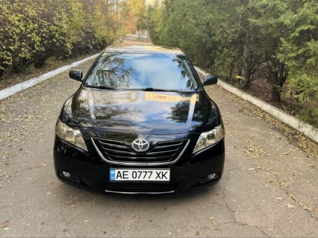 Чорний Тойота Камрі, об'ємом двигуна 2.4 л та пробігом 350 тис. км за 6399 $, фото 1 на Automoto.ua