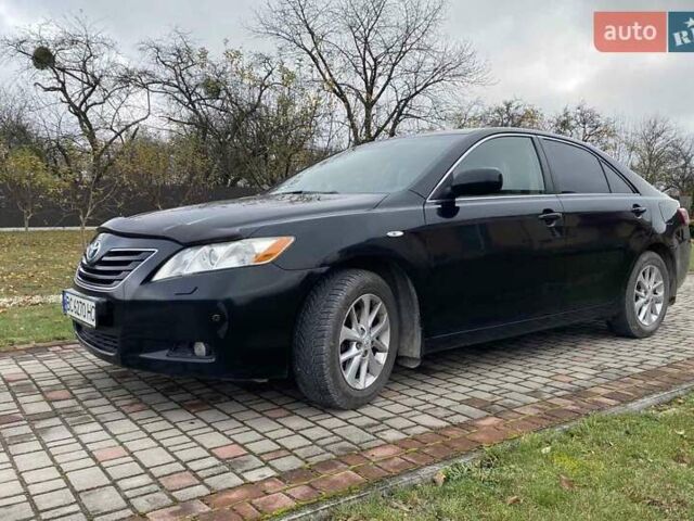 Черный Тойота Камри, объемом двигателя 2.4 л и пробегом 227 тыс. км за 8600 $, фото 13 на Automoto.ua