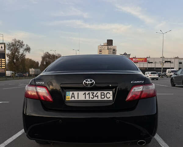 Черный Тойота Камри, объемом двигателя 2.4 л и пробегом 330 тыс. км за 9500 $, фото 5 на Automoto.ua
