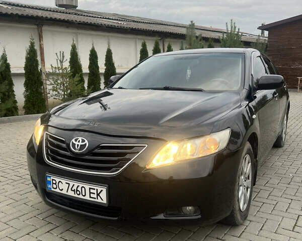 Чорний Тойота Камрі, об'ємом двигуна 2.36 л та пробігом 257 тис. км за 6500 $, фото 9 на Automoto.ua