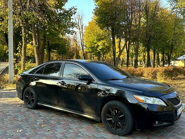Черный Тойота Камри, объемом двигателя 3.5 л и пробегом 305 тыс. км за 7499 $, фото 1 на Automoto.ua