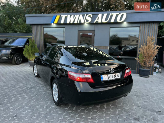 Черный Тойота Камри, объемом двигателя 2.4 л и пробегом 195 тыс. км за 8900 $, фото 21 на Automoto.ua