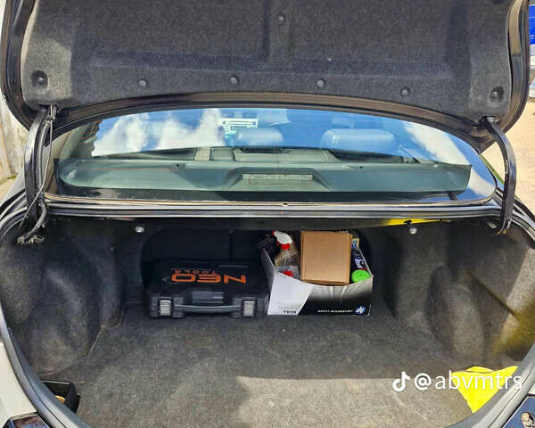 Черный Тойота Камри, объемом двигателя 2.4 л и пробегом 211 тыс. км за 7700 $, фото 8 на Automoto.ua