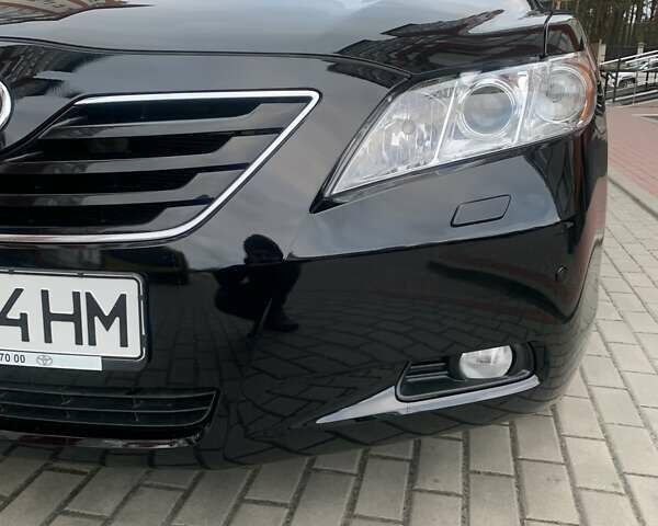 Черный Тойота Камри, объемом двигателя 3.46 л и пробегом 233 тыс. км за 10500 $, фото 1 на Automoto.ua