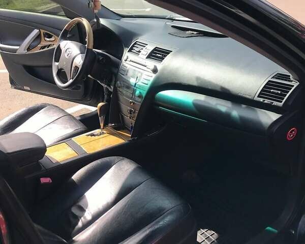 Черный Тойота Камри, объемом двигателя 3.46 л и пробегом 312 тыс. км за 13580 $, фото 4 на Automoto.ua