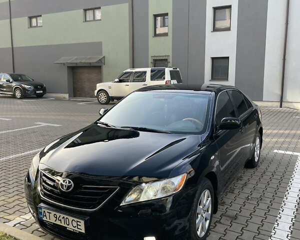 Черный Тойота Камри, объемом двигателя 3.46 л и пробегом 240 тыс. км за 9000 $, фото 1 на Automoto.ua