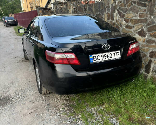 Черный Тойота Камри, объемом двигателя 2.36 л и пробегом 306 тыс. км за 7900 $, фото 1 на Automoto.ua