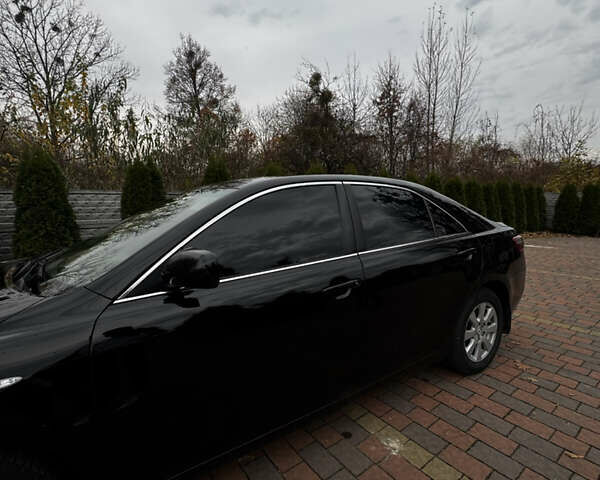 Черный Тойота Камри, объемом двигателя 2.36 л и пробегом 308 тыс. км за 7400 $, фото 7 на Automoto.ua