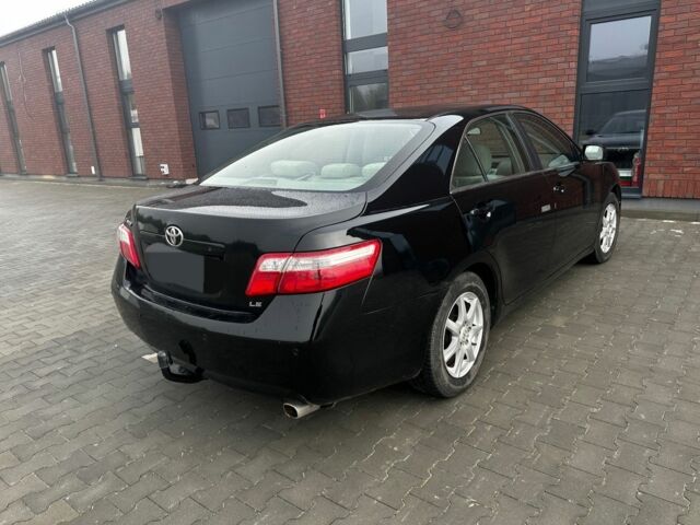 Чорний Тойота Камрі, об'ємом двигуна 2.4 л та пробігом 210 тис. км за 4550 $, фото 4 на Automoto.ua