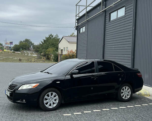 Черный Тойота Камри, объемом двигателя 2.36 л и пробегом 270 тыс. км за 7200 $, фото 2 на Automoto.ua