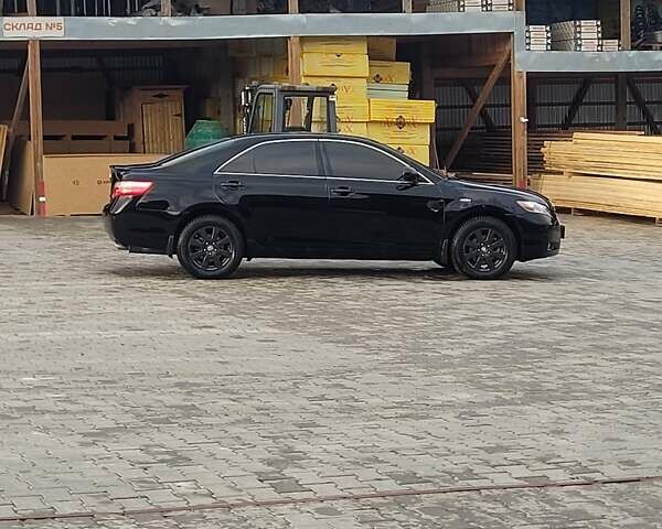 Черный Тойота Камри, объемом двигателя 3.5 л и пробегом 255 тыс. км за 11800 $, фото 4 на Automoto.ua