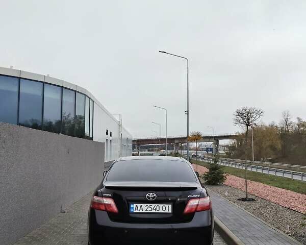 Черный Тойота Камри, объемом двигателя 2.36 л и пробегом 172 тыс. км за 11100 $, фото 1 на Automoto.ua