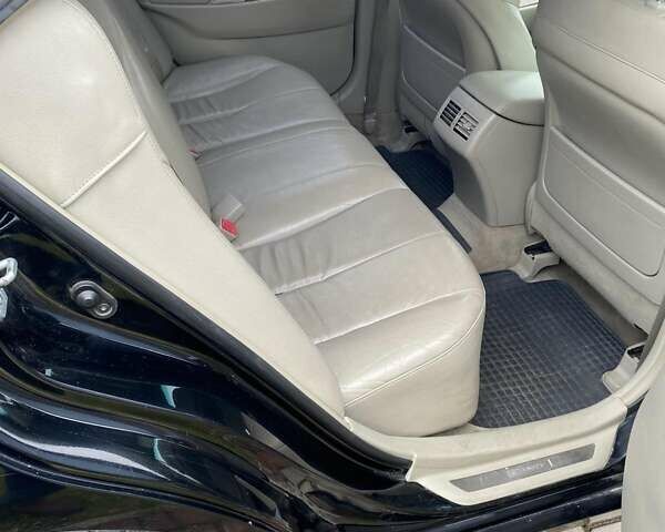 Черный Тойота Камри, объемом двигателя 2.4 л и пробегом 227 тыс. км за 8600 $, фото 8 на Automoto.ua