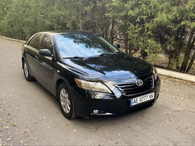 Чорний Тойота Камрі, об'ємом двигуна 2.4 л та пробігом 350 тис. км за 6399 $, фото 2 на Automoto.ua