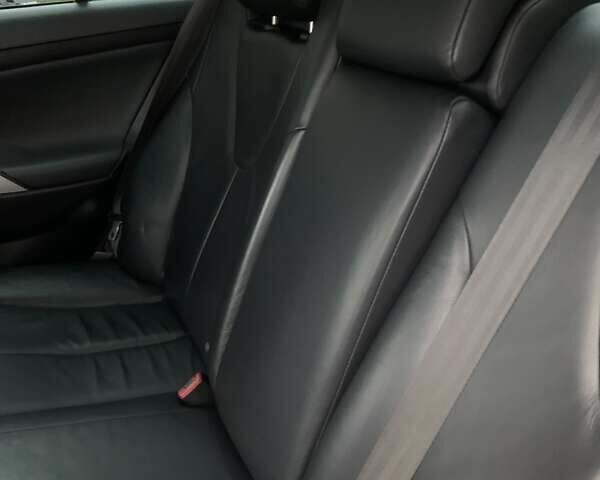 Черный Тойота Камри, объемом двигателя 3.46 л и пробегом 233 тыс. км за 10500 $, фото 19 на Automoto.ua