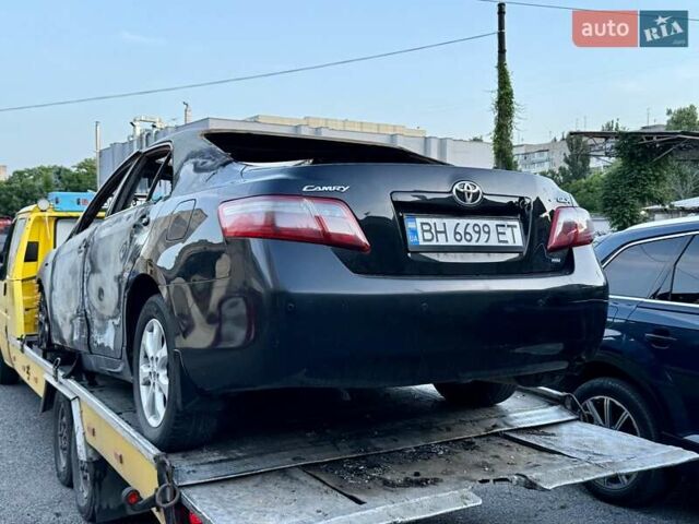 Черный Тойота Камри, объемом двигателя 2.4 л и пробегом 61 тыс. км за 999 $, фото 1 на Automoto.ua