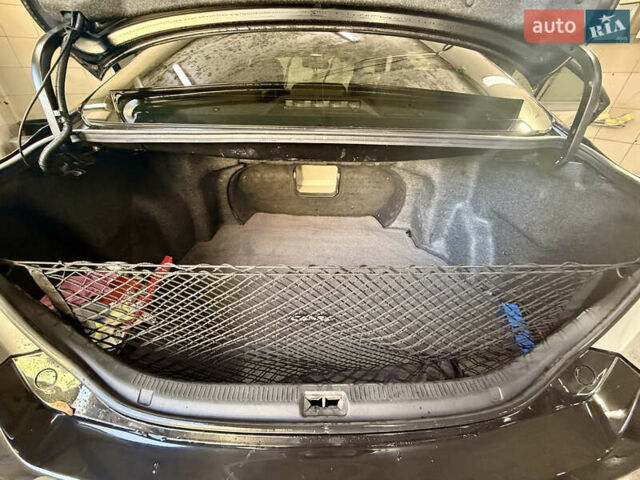 Черный Тойота Камри, объемом двигателя 3.46 л и пробегом 198 тыс. км за 10000 $, фото 1 на Automoto.ua