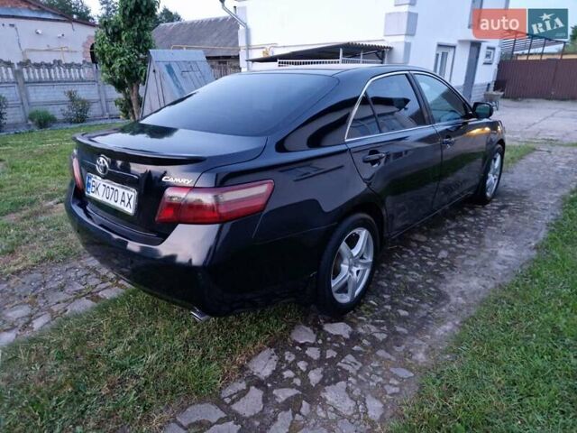 Чорний Тойота Камрі, об'ємом двигуна 2.36 л та пробігом 299 тис. км за 8888 $, фото 2 на Automoto.ua