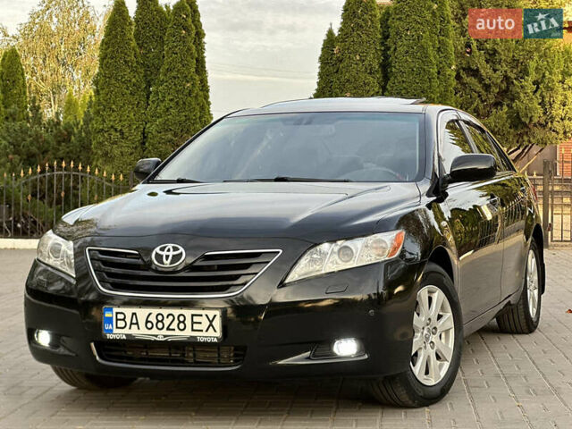 Черный Тойота Камри, объемом двигателя 3.46 л и пробегом 187 тыс. км за 11300 $, фото 1 на Automoto.ua