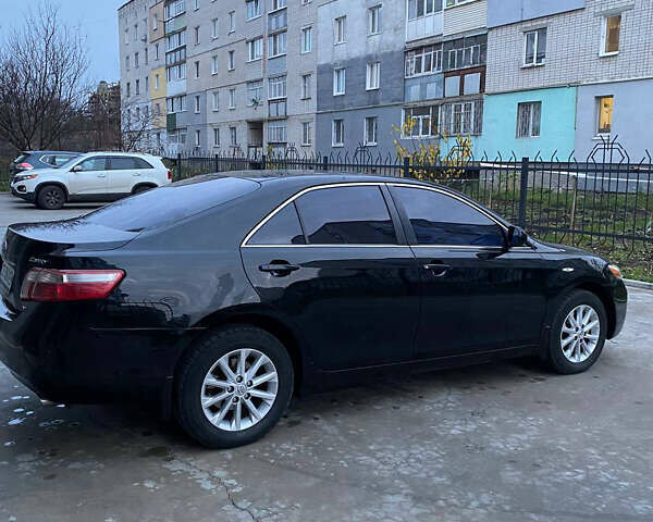 Чорний Тойота Камрі, об'ємом двигуна 3.46 л та пробігом 290 тис. км за 8500 $, фото 5 на Automoto.ua