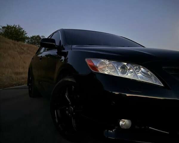 Черный Тойота Камри, объемом двигателя 3.5 л и пробегом 291 тыс. км за 10500 $, фото 10 на Automoto.ua