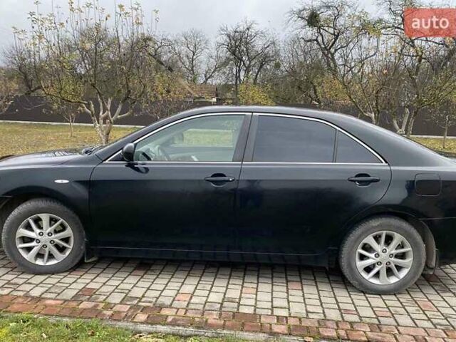 Черный Тойота Камри, объемом двигателя 2.4 л и пробегом 227 тыс. км за 8600 $, фото 5 на Automoto.ua