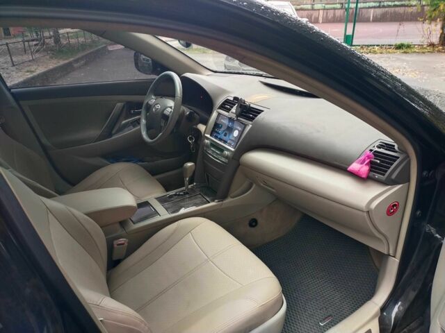 Чорний Тойота Камрі, об'ємом двигуна 2.4 л та пробігом 292 тис. км за 6995 $, фото 7 на Automoto.ua