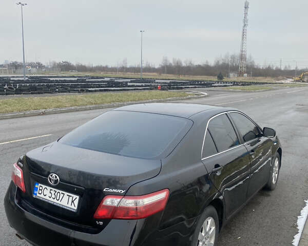Черный Тойота Камри, объемом двигателя 3.5 л и пробегом 252 тыс. км за 10200 $, фото 6 на Automoto.ua