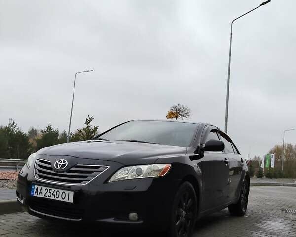 Черный Тойота Камри, объемом двигателя 2.36 л и пробегом 172 тыс. км за 11100 $, фото 2 на Automoto.ua