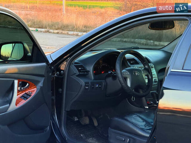 Чорний Тойота Камрі, об'ємом двигуна 2.36 л та пробігом 344 тис. км за 8999 $, фото 10 на Automoto.ua