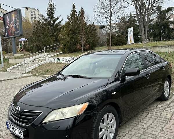 Чорний Тойота Камрі, об'ємом двигуна 2.4 л та пробігом 290 тис. км за 7500 $, фото 1 на Automoto.ua