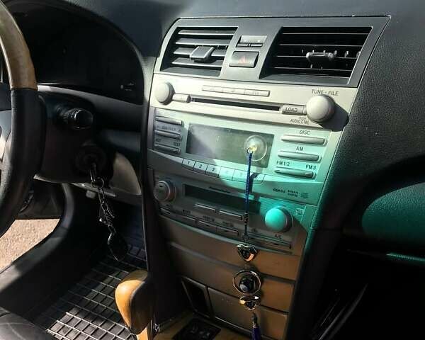 Черный Тойота Камри, объемом двигателя 3.46 л и пробегом 312 тыс. км за 13580 $, фото 3 на Automoto.ua