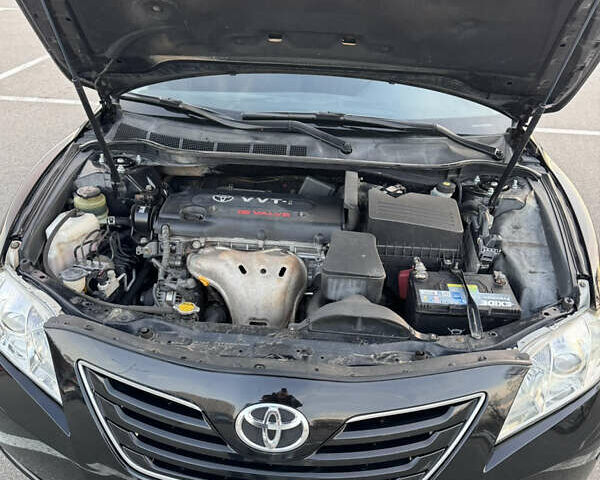 Черный Тойота Камри, объемом двигателя 2.4 л и пробегом 330 тыс. км за 9500 $, фото 10 на Automoto.ua