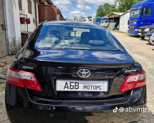 Черный Тойота Камри, объемом двигателя 2.4 л и пробегом 211 тыс. км за 7700 $, фото 3 на Automoto.ua