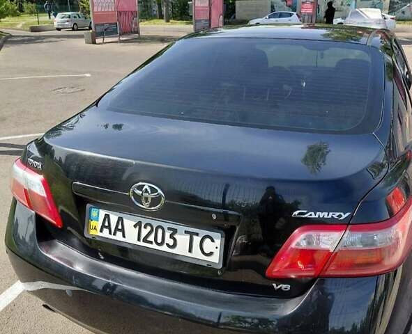 Черный Тойота Камри, объемом двигателя 3.46 л и пробегом 312 тыс. км за 13580 $, фото 1 на Automoto.ua