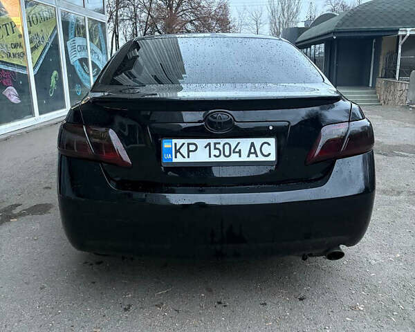 Черный Тойота Камри, объемом двигателя 2.36 л и пробегом 357 тыс. км за 6900 $, фото 2 на Automoto.ua