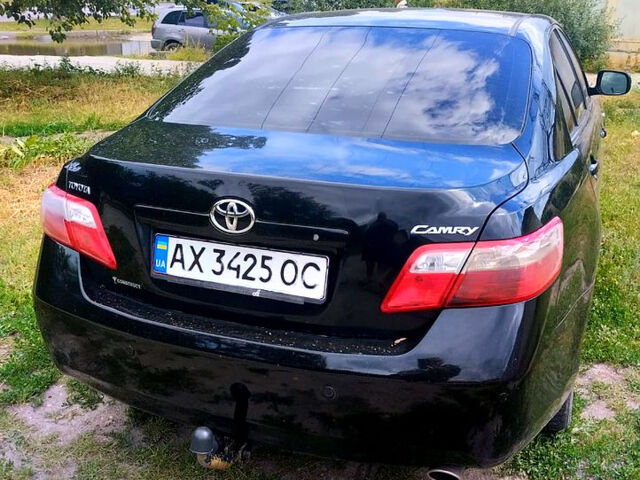 Черный Тойота Камри, объемом двигателя 2.4 л и пробегом 250 тыс. км за 6799 $, фото 2 на Automoto.ua