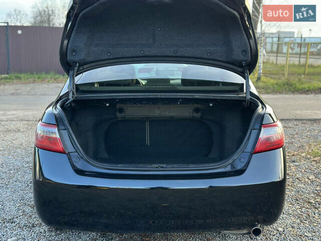 Чорний Тойота Камрі, об'ємом двигуна 2.4 л та пробігом 297 тис. км за 7999 $, фото 44 на Automoto.ua