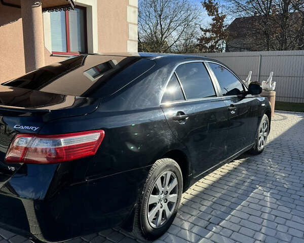 Чорний Тойота Камрі, об'ємом двигуна 3.46 л та пробігом 153 тис. км за 11200 $, фото 2 на Automoto.ua