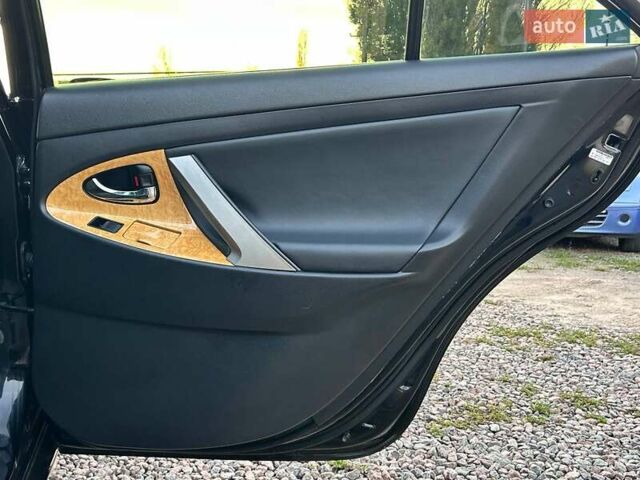 Черный Тойота Камри, объемом двигателя 2.4 л и пробегом 197 тыс. км за 8100 $, фото 28 на Automoto.ua