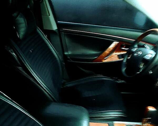 Черный Тойота Камри, объемом двигателя 3.5 л и пробегом 255 тыс. км за 11800 $, фото 24 на Automoto.ua