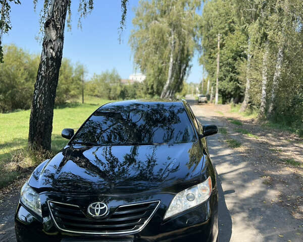 Чорний Тойота Камрі, об'ємом двигуна 3.46 л та пробігом 310 тис. км за 7499 $, фото 1 на Automoto.ua