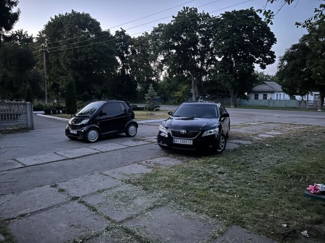 Черный Тойота Камри, объемом двигателя 3.5 л и пробегом 380 тыс. км за 8300 $, фото 1 на Automoto.ua