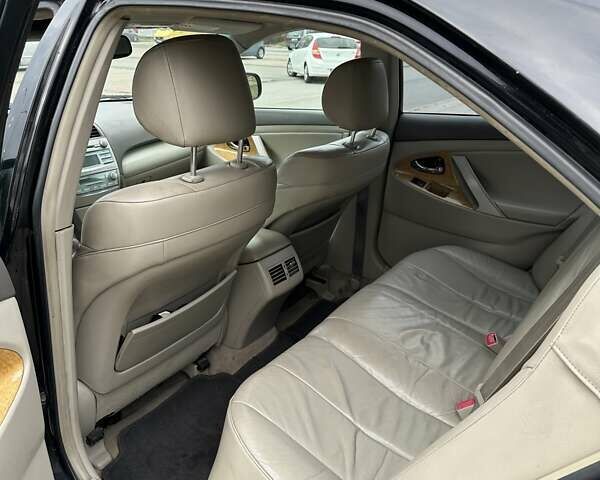 Чорний Тойота Камрі, об'ємом двигуна 2.4 л та пробігом 290 тис. км за 7500 $, фото 7 на Automoto.ua