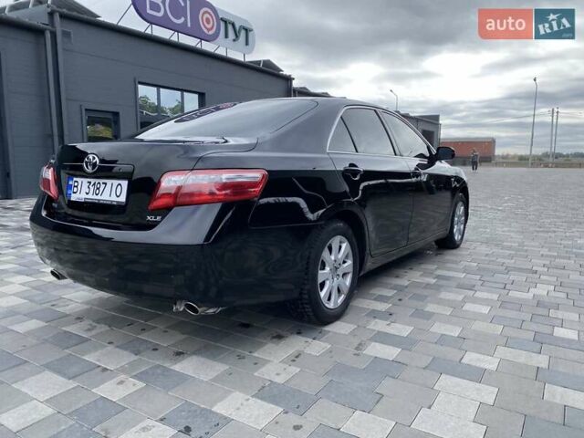 Чорний Тойота Камрі, об'ємом двигуна 3.46 л та пробігом 336 тис. км за 8900 $, фото 1 на Automoto.ua